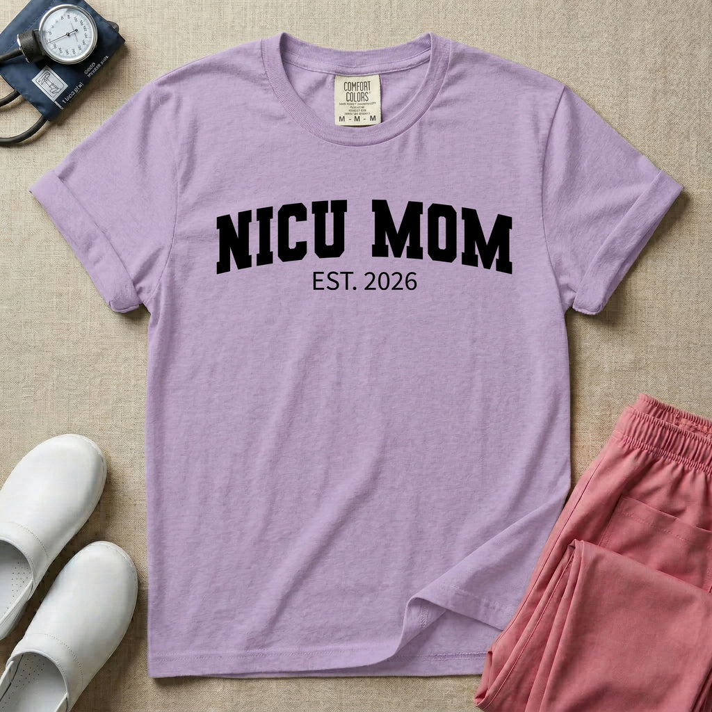 A minimalist personalized t-shirt for the NICU unit featuring bold white collegiate varsity lettering that reads NICU MOM arched over the text EST. 2026.