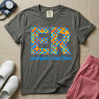A retro-style design for emergency room staff featuring the large letters ER filled with a checkered pattern and small lightning bolts, above the script text emergency room team.