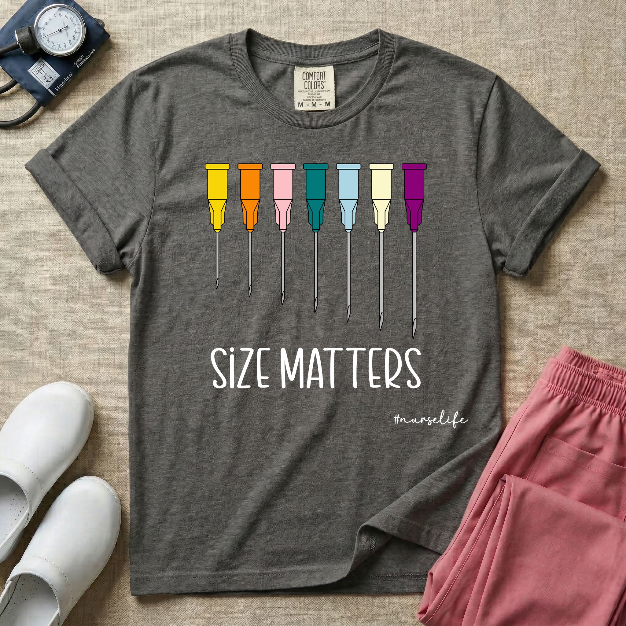 Graphic illustration of a row of colorful IV catheter needles in various gauge sizes lined up above the text SIZE MATTERS and nurselife hashtag.