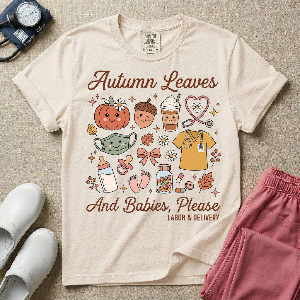 Cute retro Labor and Delivery nurse design featuring the text Autumn Leaves And Babies Please surrounded by a smiling pumpkin, iced coffee cup, heart-shaped stethoscope, scrub top, baby bottle, pacifier, and autumn leaves.