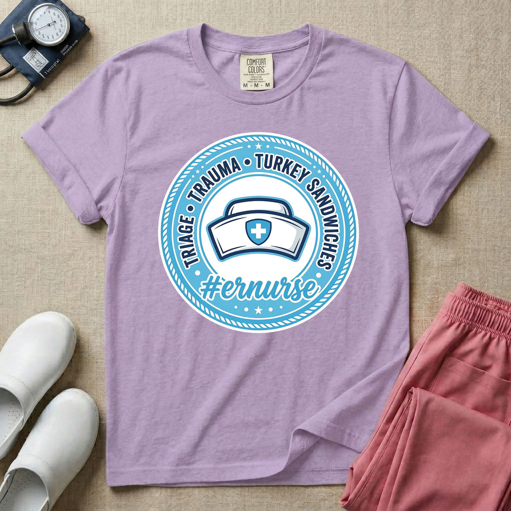 Funny Emergency Room nurse design featuring a circular rope badge emblem with a classic nurse cap centered inside, bordered by stars and the text Triage Trauma Turkey Sandwiches with hashtag er nurse.