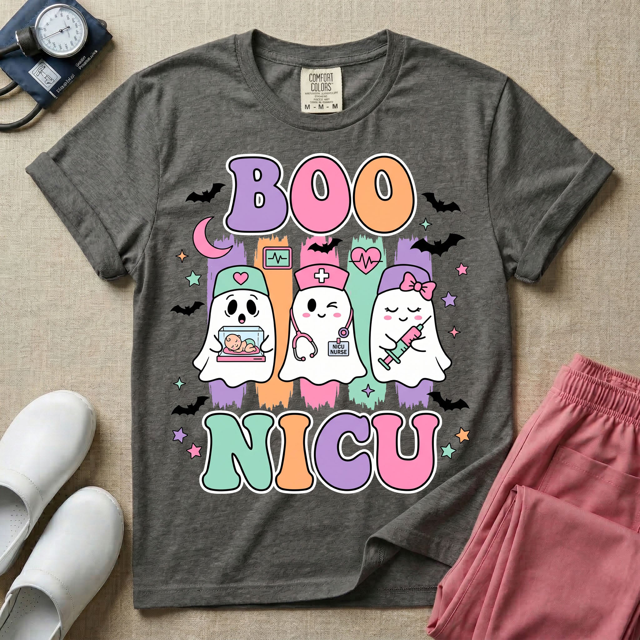 Cute Halloween NICU nurse design featuring the text Boo NICU in retro bubble letters with three ghost nurses holding an incubator baby, stethoscope, and syringe surrounded by flying bats and pastel stars.