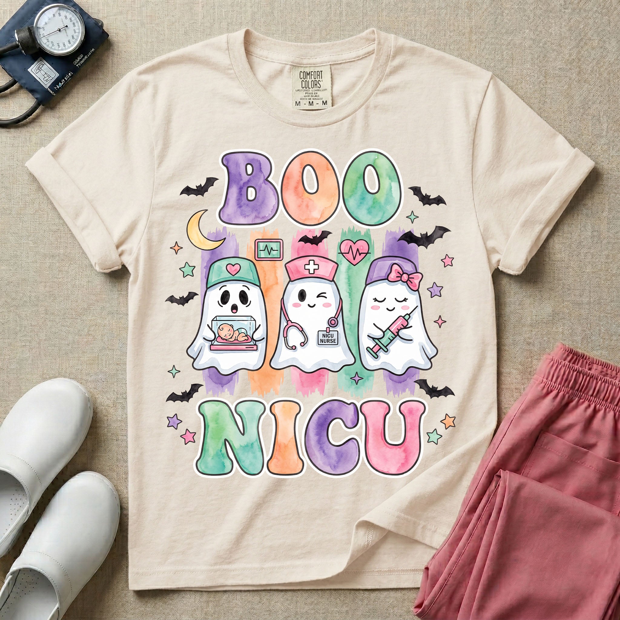 Cute Halloween NICU nurse design featuring watercolor textured retro bubble letters spelling Boo NICU with three ghost nurses holding an incubator baby, stethoscope, and syringe surrounded by bats and stars.