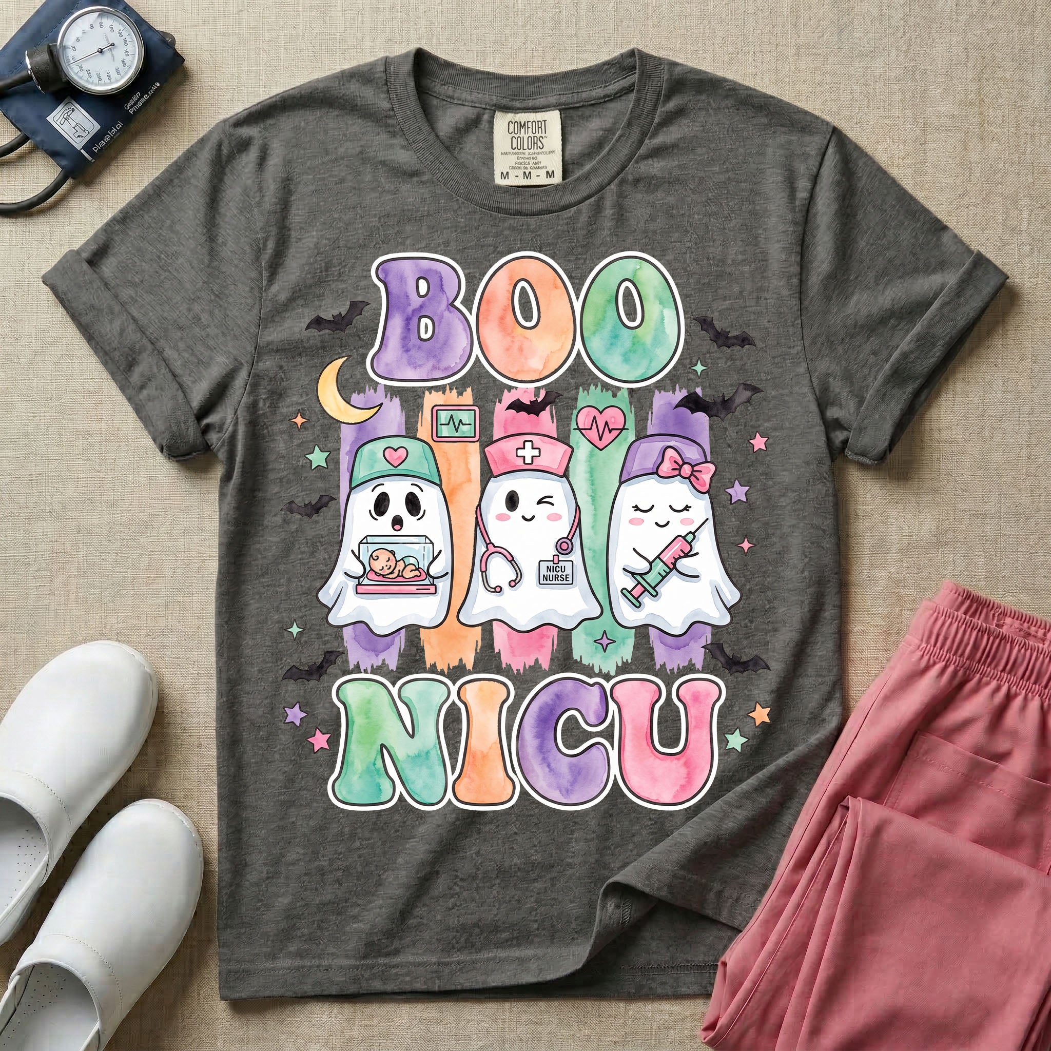 Cute Halloween NICU nurse design featuring watercolor textured retro bubble letters spelling Boo NICU with three ghost nurses holding an incubator baby, stethoscope, and syringe surrounded by bats and stars.