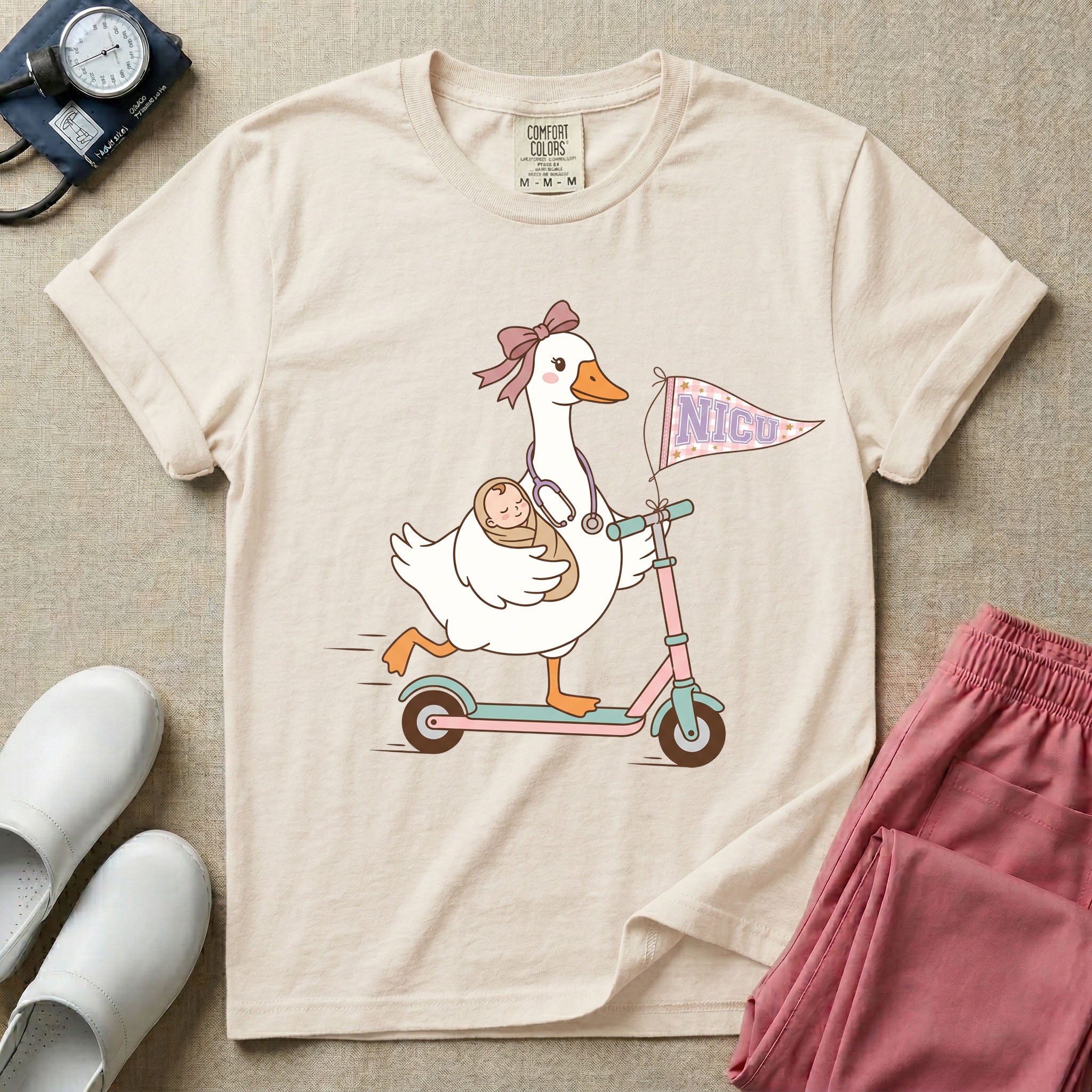 Cute NICU nurse design featuring an adorable goose wearing a ribbon bow and stethoscope riding a scooter while carrying a swaddled newborn baby, with a pennant flag reading NICU attached to the handlebars.