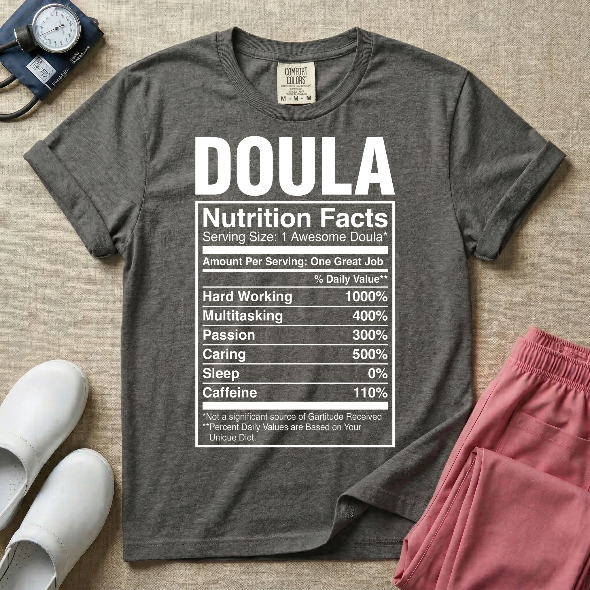 Funny doula design featuring bold text reading Doula above a novelty nutrition facts label listing humorous daily values for hard working, multitasking, passion, caring, zero sleep, and caffeine.