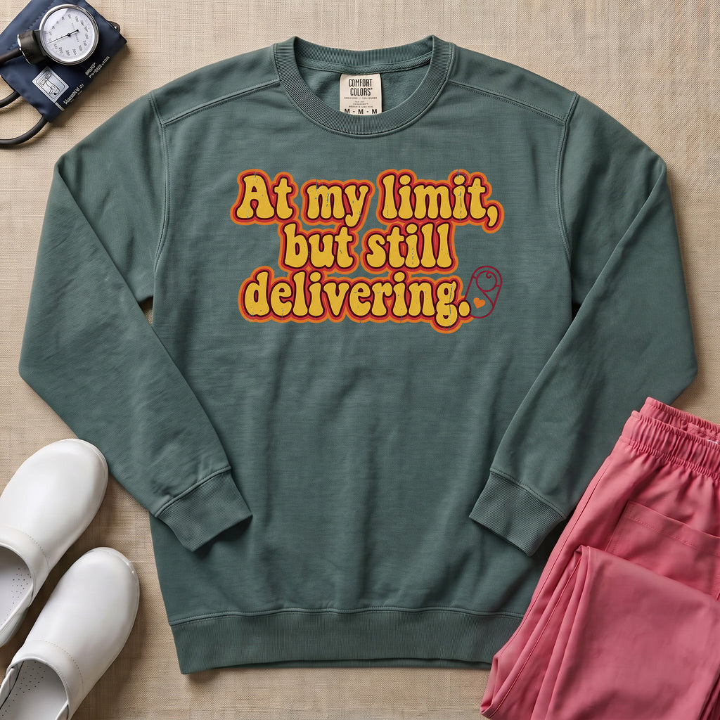 Funny L&D Nurse At My Limit But Still Delivering Retro Sweatshirt - Blue Spruce Comfort Colors Sweatshirt | HugTee