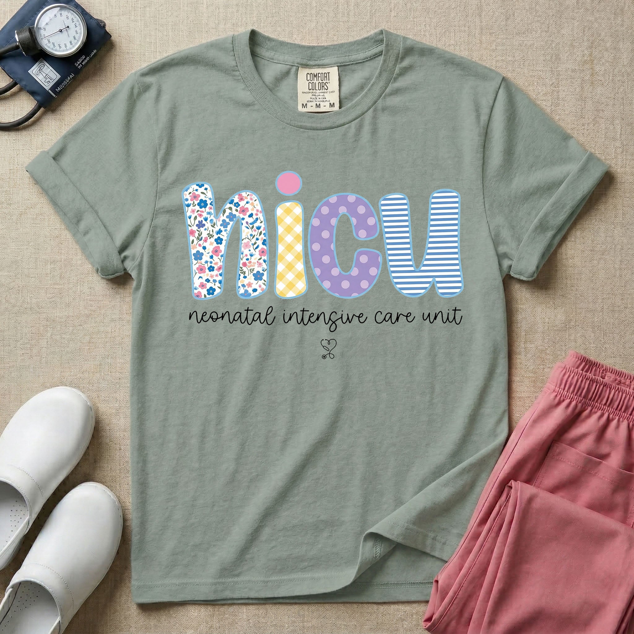 Neonatal Intensive Care Unit NICU nurse t-shirt with boho floral block letters in bay color.