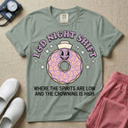 Labor and Delivery L&D night shift nurse t-shirt with a funny retro donut graphic where the spirits are low and the crowning is high in bay color.