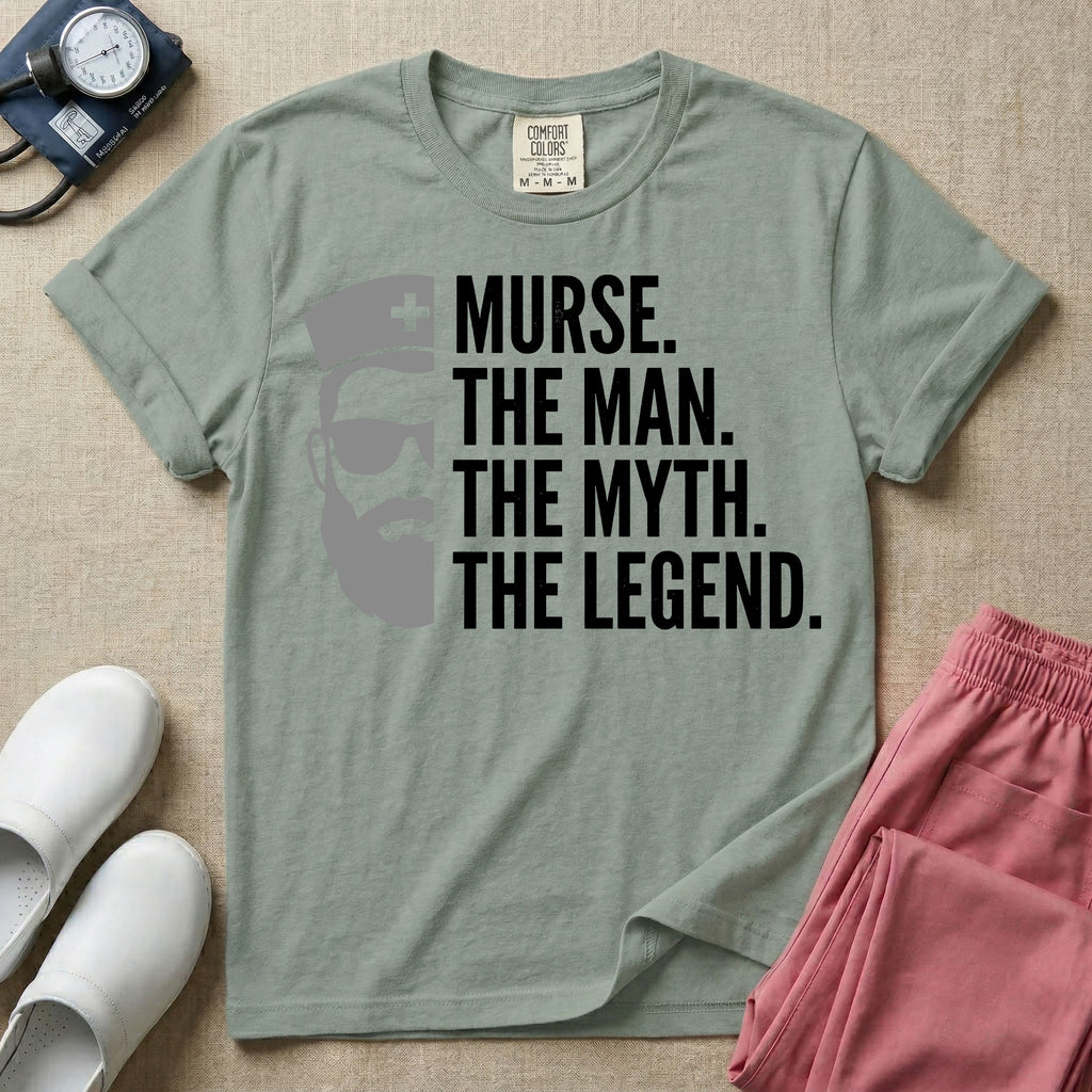 General nursing t-shirt featuring a minimalist white graphic of a bearded man wearing sunglasses and a nurse cap alongside the text "MURSE. THE MAN. THE MYTH. THE LEGEND."