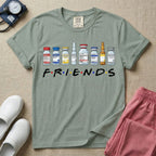 A humorous retro-style t-shirt for nurses featuring a row of seven different medical vials and medicine ampules lined up above the word "FRIENDS", which is styled with colored dots between the letters to resemble the classic television show logo.