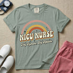 Neonatal Intensive Care Unit NICU nurse t-shirt with a retro vintage rainbow and tiny humans big attitude graphic in bay color.