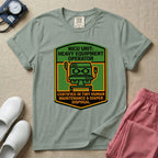 A graphic resembling a patch with green borders and orange inner sections featuring an illustration of a medical incubator in the center, with the text 'NICU UNIT: HEAVY EQUIPMENT OPERATOR' at the top and 'CERTIFIED IN TINY HUMAN MAINTENANCE & DIAPER DISPOSAL' at the bottom.
