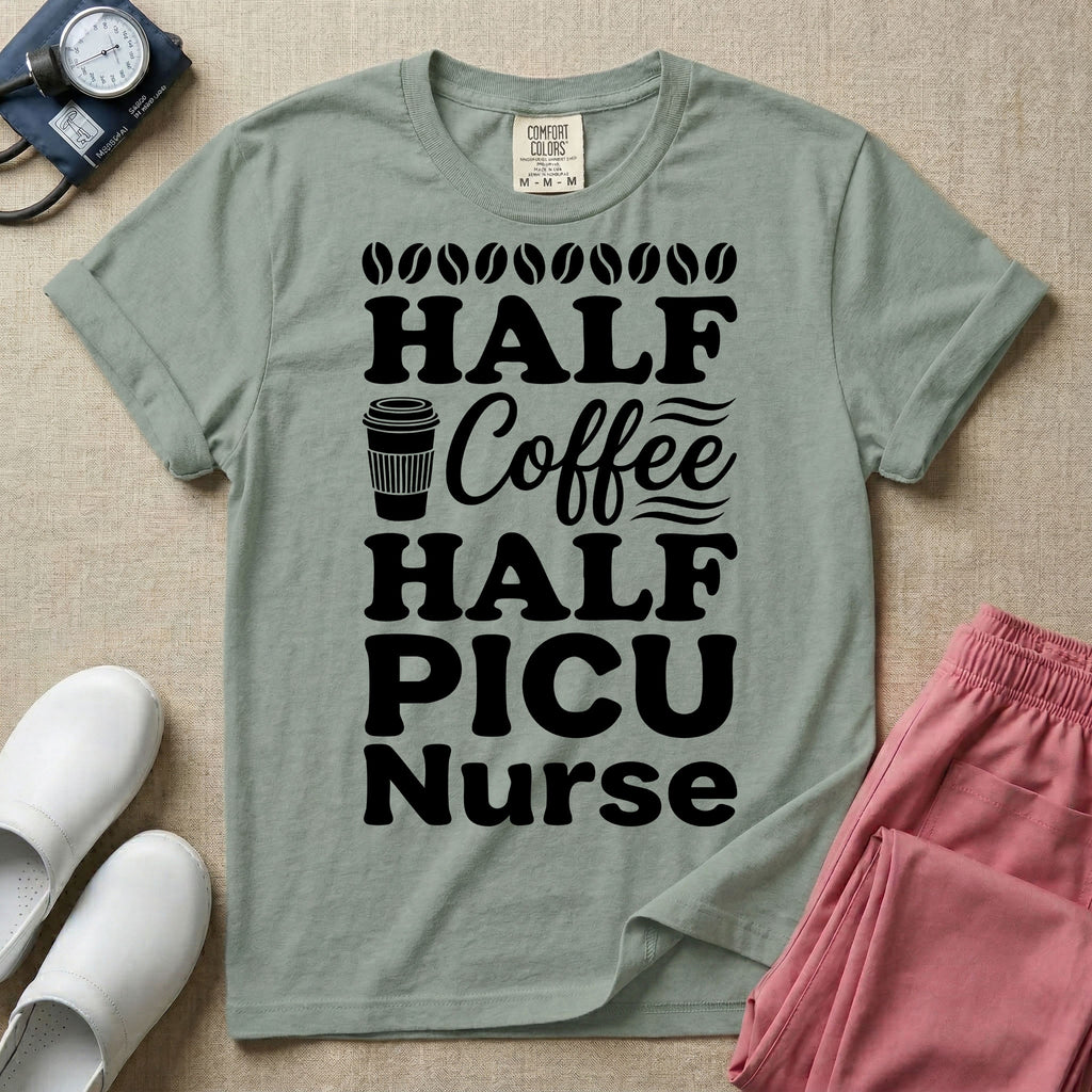 A funny pediatric intensive care nursing t-shirt featuring the stacked white text "HALF COFFEE HALF PICU Nurse" accented with simple graphics of coffee beans and a to-go coffee cup.