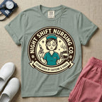 General nursing night shift nurse t-shirt with a retro vintage exhausted nurse holding coffee and a syringe established by caffeine and chaos graphic in bay color.