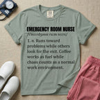 A minimalist t-shirt for emergency room nurses featuring a dictionary definition graphic for the term "EMERGENCY ROOM NURSE" with a phonetic pronunciation and a humorous description about running toward problems, using coffee as fuel, and thriving in chaos.