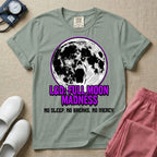 A humorous Labor and Delivery nurse graphic featuring a screaming face morphing out of a full moon, accompanied by purple dripping text that reads L&D: FULL MOON MADNESS and distressed black text below reading NO SLEEP. NO BREAKS. NO MERCY.