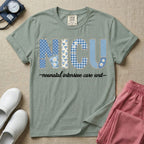 A t-shirt for NICU nurses featuring the large text "NICU" designed to look like faux embroidery with floral and plaid patterns, and the words "neonatal intensive care unit" written in a delicate script font underneath.