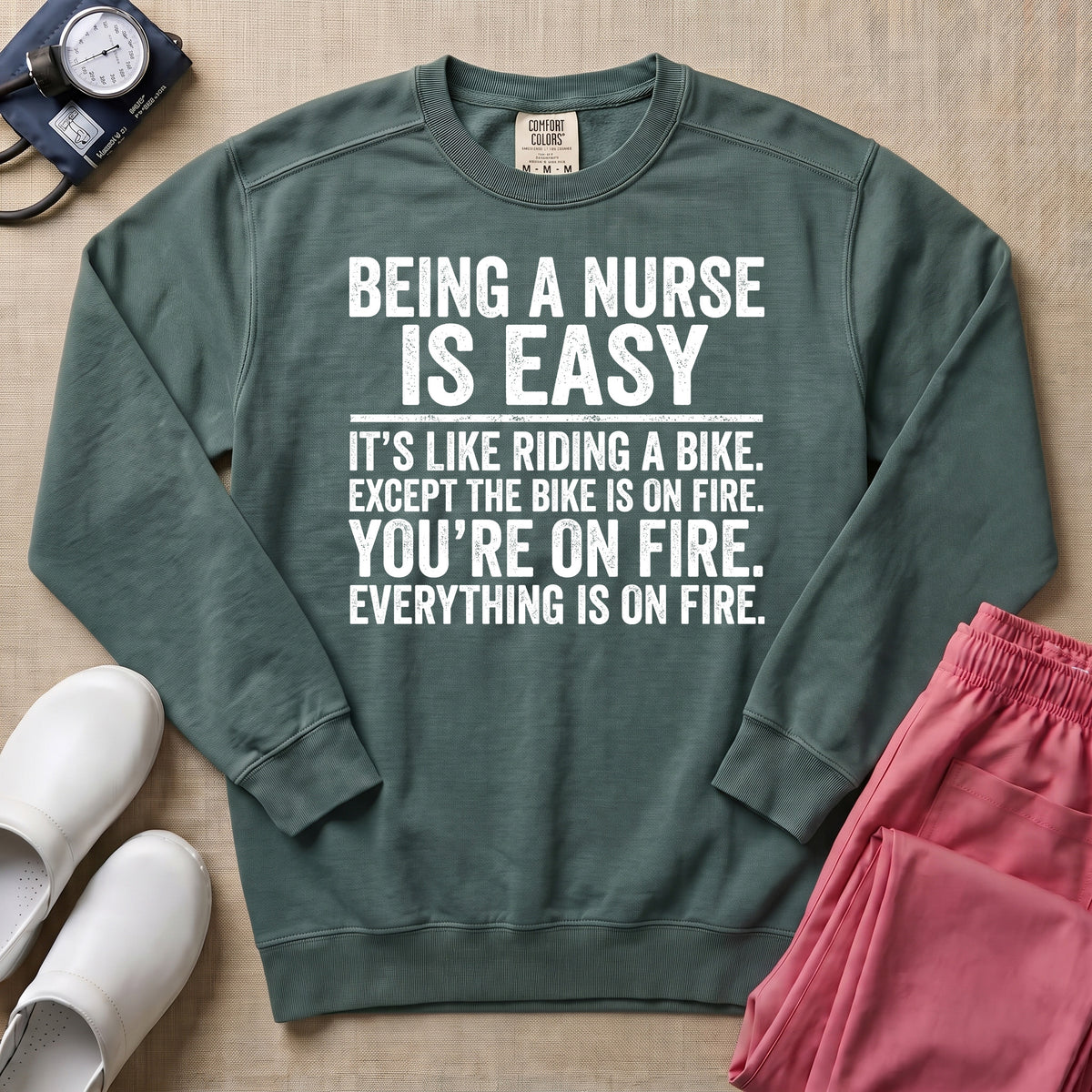 Funny Being A Nurse Is Easy Bike On Fire Sarcastic Nurse Sweatshirt - Blue Spruce Comfort Colors Sweatshirt | HugTee