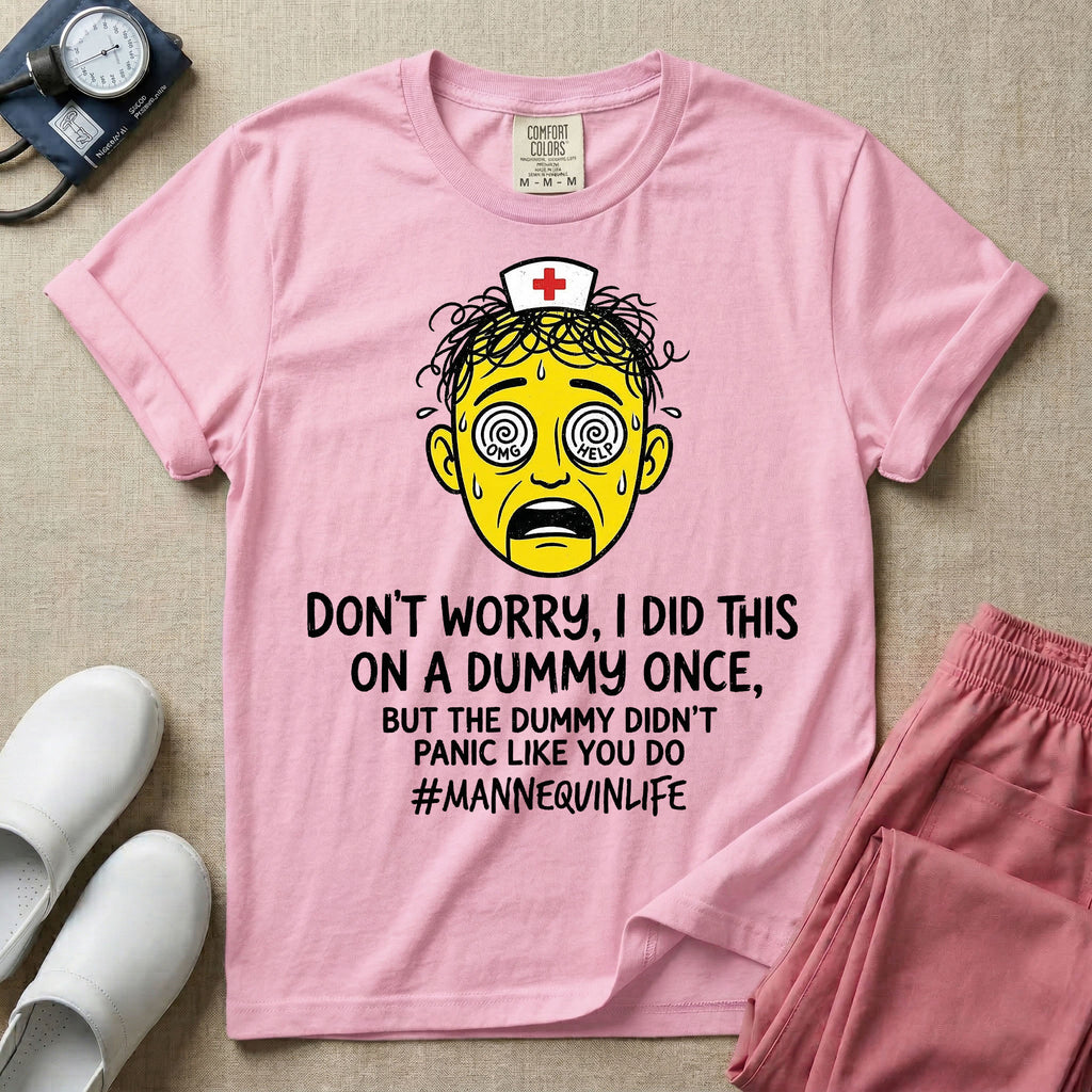 General nursing nurse t-shirt with a funny don't worry I did this on a mannequin once but the dummy didn't panic like you do graphic in blossom color.
