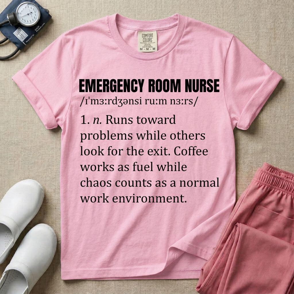 A minimalist t-shirt for emergency room nurses featuring a dictionary definition graphic for the term "EMERGENCY ROOM NURSE" with a phonetic pronunciation and a humorous description about running toward problems, using coffee as fuel, and thriving in chaos.