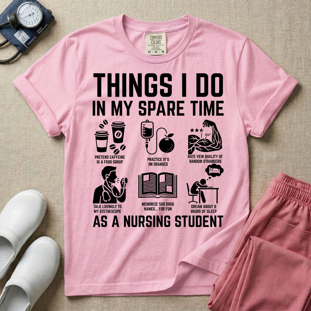 A t-shirt featuring the text THINGS I DO IN MY SPARE TIME AS A NURSING STUDENT surrounded by humorous line-art icons depicting studying, drinking coffee, and lacking sleep.