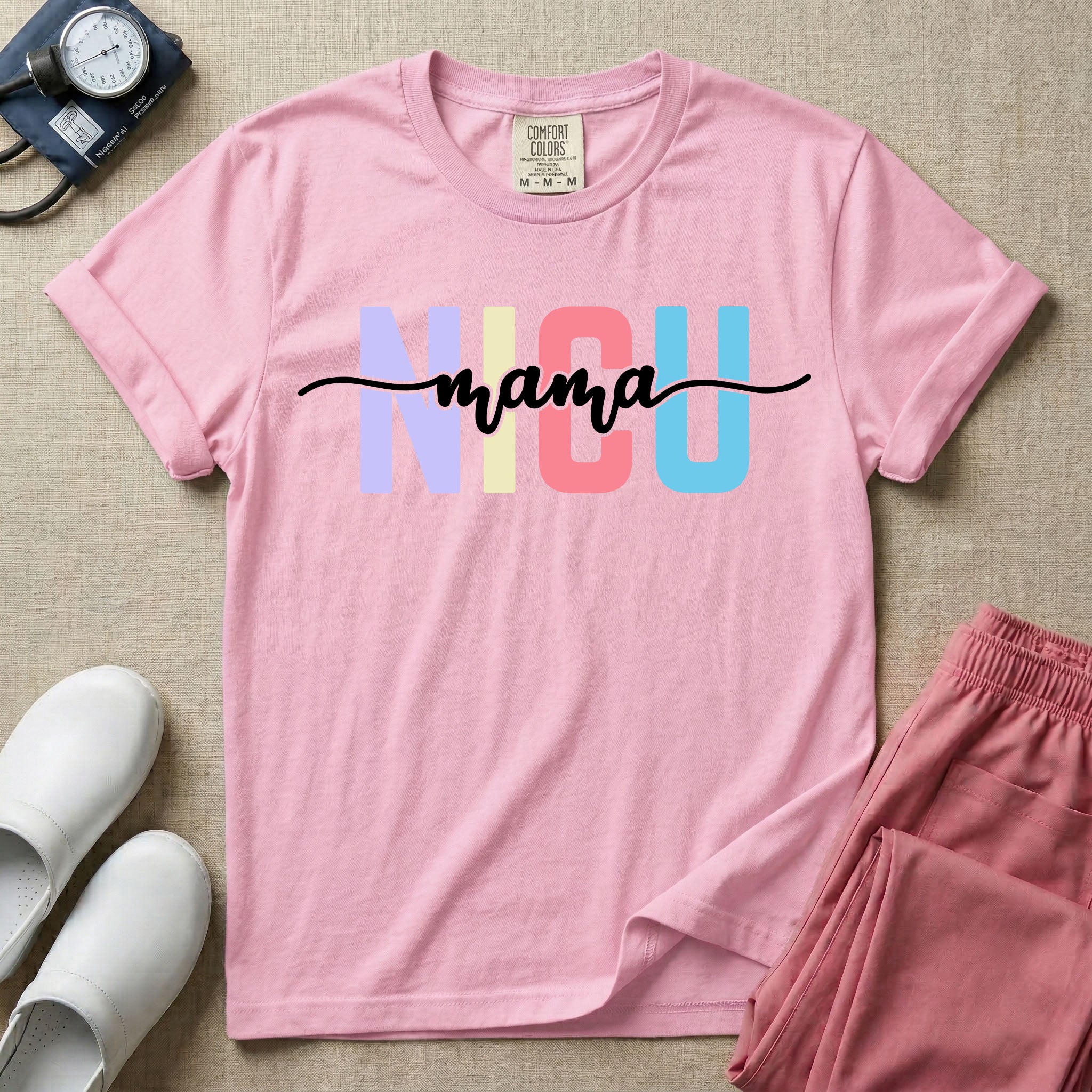 A graphic for the Neonatal Intensive Care Unit featuring the word 'NICU' in large, colorful pastel block letters with the word 'mama' written in a flowing white cursive font across the center.