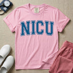A minimalist graphic for the Neonatal Intensive Care Unit featuring the word 'NICU' printed in large, white, collegiate-style block letters across the chest.