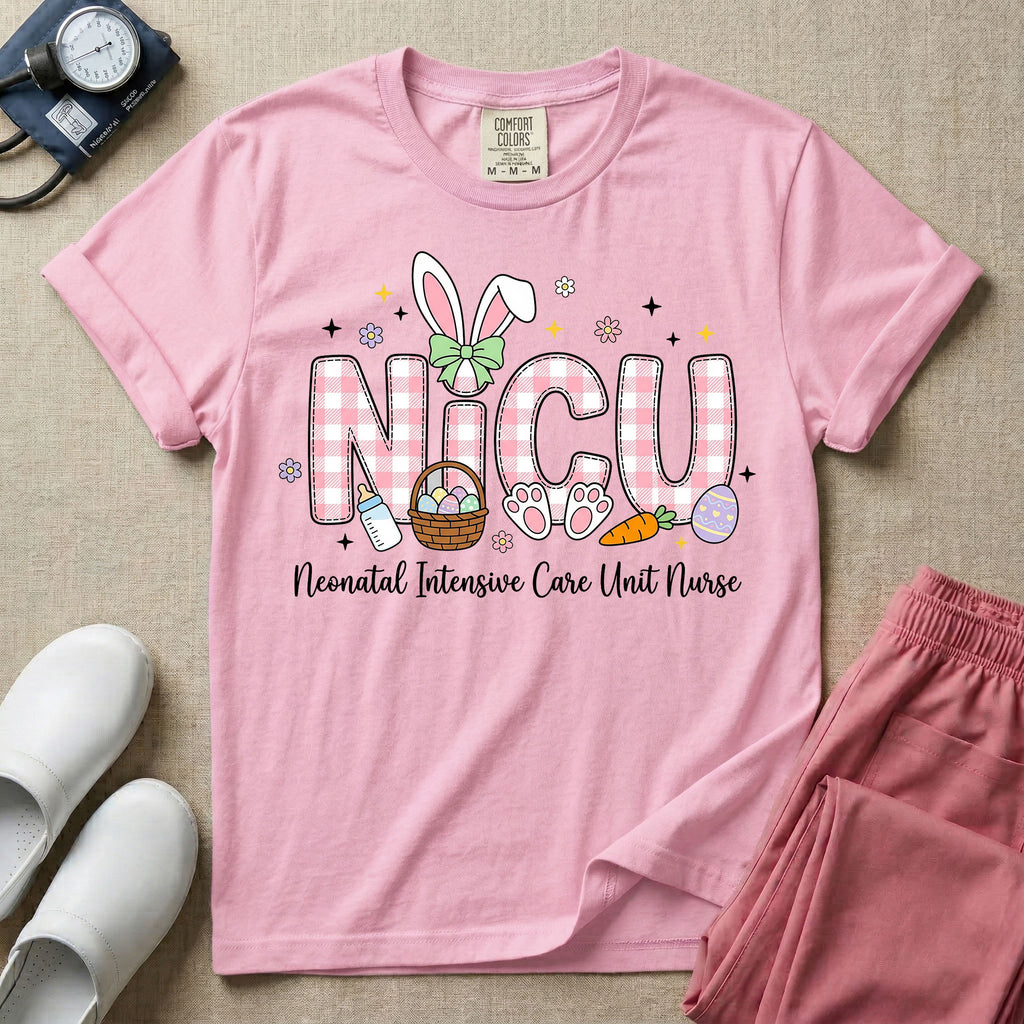 Neonatal Intensive Care Unit NICU nursing t-shirt featuring the letters NICU in a pink plaid pattern with bunny ears on the I, alongside a basket and Easter eggs, positioned above the cursive text "Neonatal Intensive Care Unit Nurse".