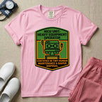 A graphic resembling a patch with green borders and orange inner sections featuring an illustration of a medical incubator in the center, with the text 'NICU UNIT: HEAVY EQUIPMENT OPERATOR' at the top and 'CERTIFIED IN TINY HUMAN MAINTENANCE & DIAPER DISPOSAL' at the bottom.