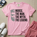 General nursing t-shirt featuring a minimalist white graphic of a bearded man wearing sunglasses and a nurse cap alongside the text "MURSE. THE MAN. THE MYTH. THE LEGEND."