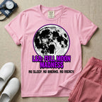 A humorous Labor and Delivery nurse graphic featuring a screaming face morphing out of a full moon, accompanied by purple dripping text that reads L&D: FULL MOON MADNESS and distressed black text below reading NO SLEEP. NO BREAKS. NO MERCY.