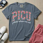 A boho pediatric intensive care nursing t-shirt featuring the large block text "PICU" filled with a decorative floral pattern, positioned above the cursive white text "pediatric intensive care unit".