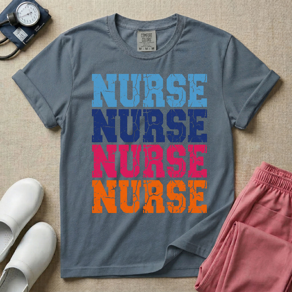 A t-shirt featuring the word NURSE repeated four times in a stacked vertical layout with a distressed, vintage texture in blue, navy, pink, and orange colors.