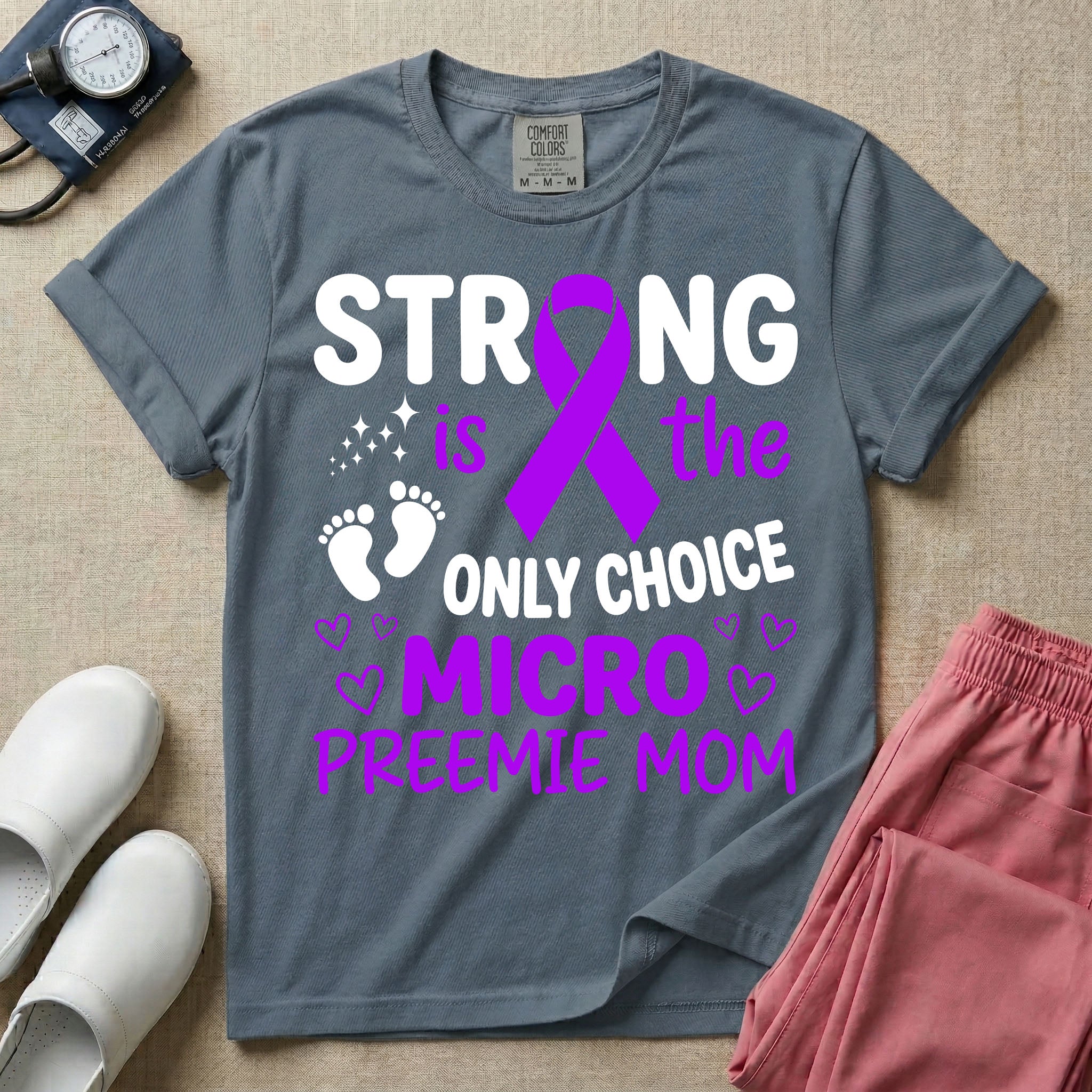 A graphic for the Neonatal Intensive Care Unit featuring the text 'STRONG is the ONLY CHOICE' stacked above 'MICRO PREEMIE MOM', incorporating a large purple awareness ribbon, tiny baby footprints, and small purple outline hearts.