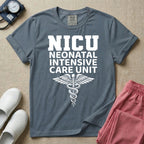 A t-shirt featuring the word NICU in large collegiate block letters above the spelled-out text Neonatal Intensive Care Unit and a medical caduceus symbol.