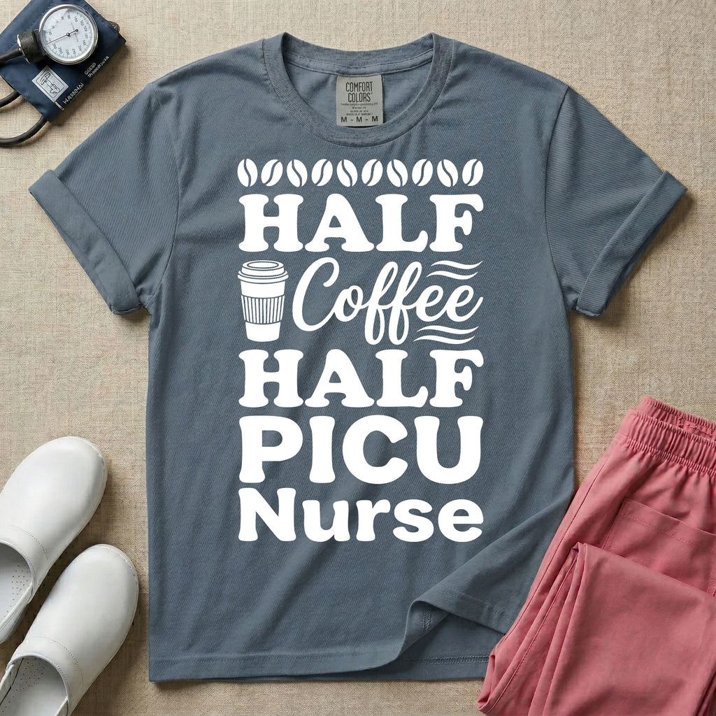 A funny pediatric intensive care nursing t-shirt featuring the stacked white text "HALF COFFEE HALF PICU Nurse" accented with simple graphics of coffee beans and a to-go coffee cup.