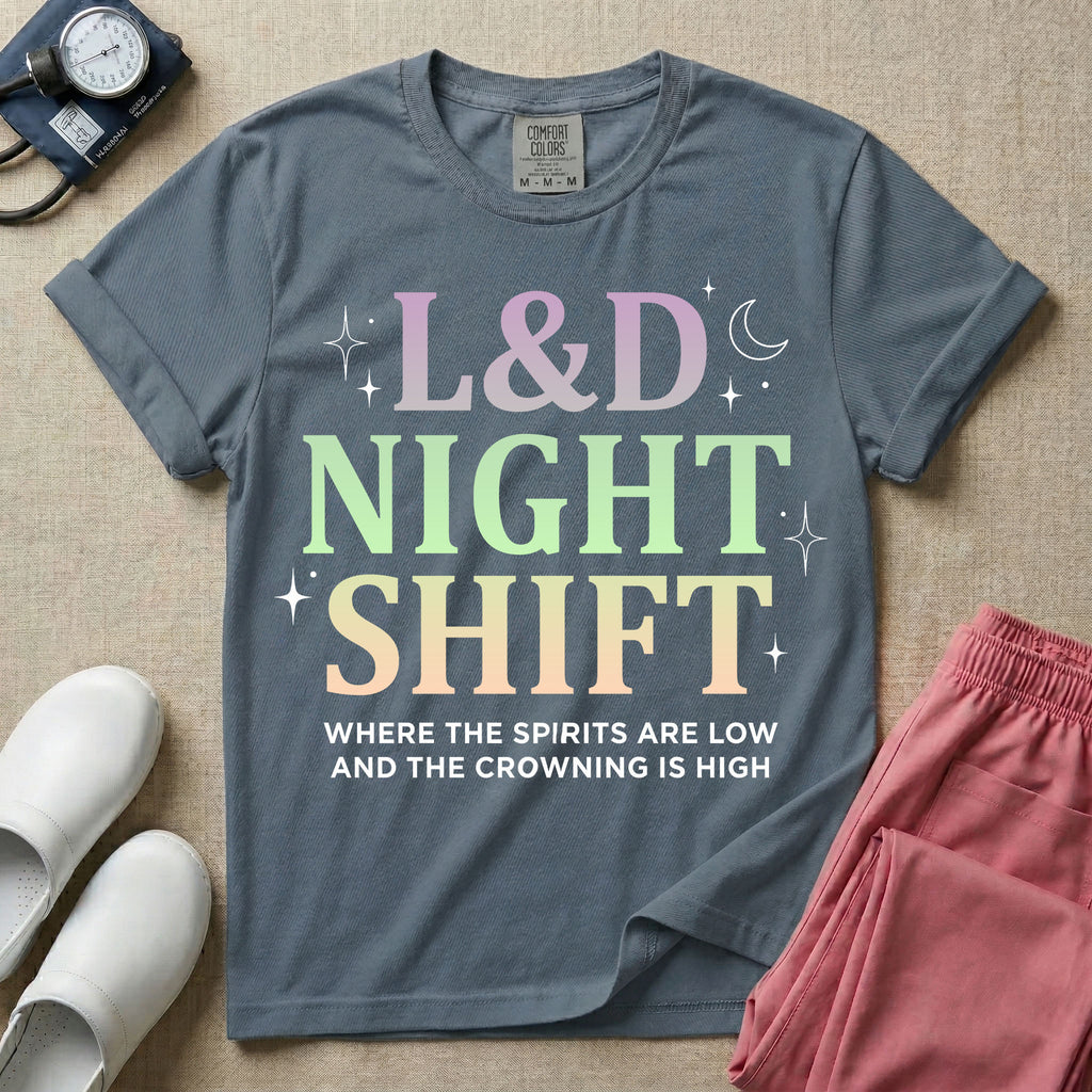 Labor and Delivery L&D night shift nurse t-shirt with pastel typography where the spirits are low and the crowning is high graphic in blue jean color.