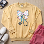 Coquette Bow Stethoscope Sweatshirt - Butter Comfort Colors Sweatshirt | HugTee