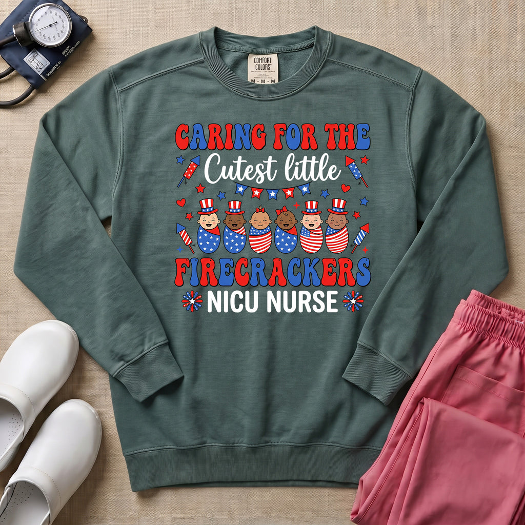 4th of July NICU Nurse Cutest Little Firecrackers Sweatshirt - Blue Spruce Comfort Colors Sweatshirt | HugTee