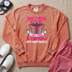 Don't Mess With Me I Stab People Funny ER Nurse Gift Sweatshirt - Terracotta Comfort Colors Sweatshirt | HugTee