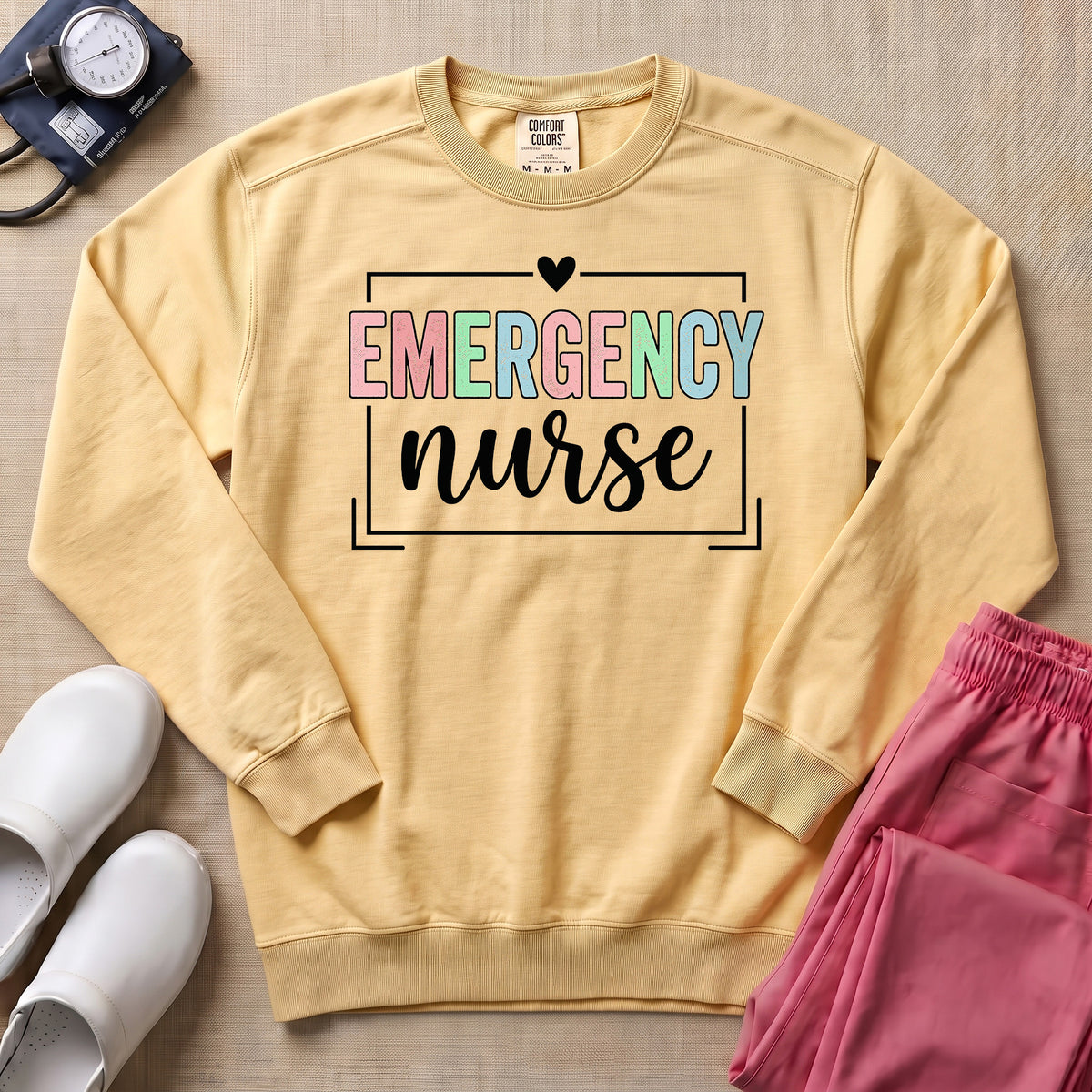 Retro Pastel Emergency Nurse ER Heart Frame Sweatshirt - Butter Comfort Colors Sweatshirt | HugTee