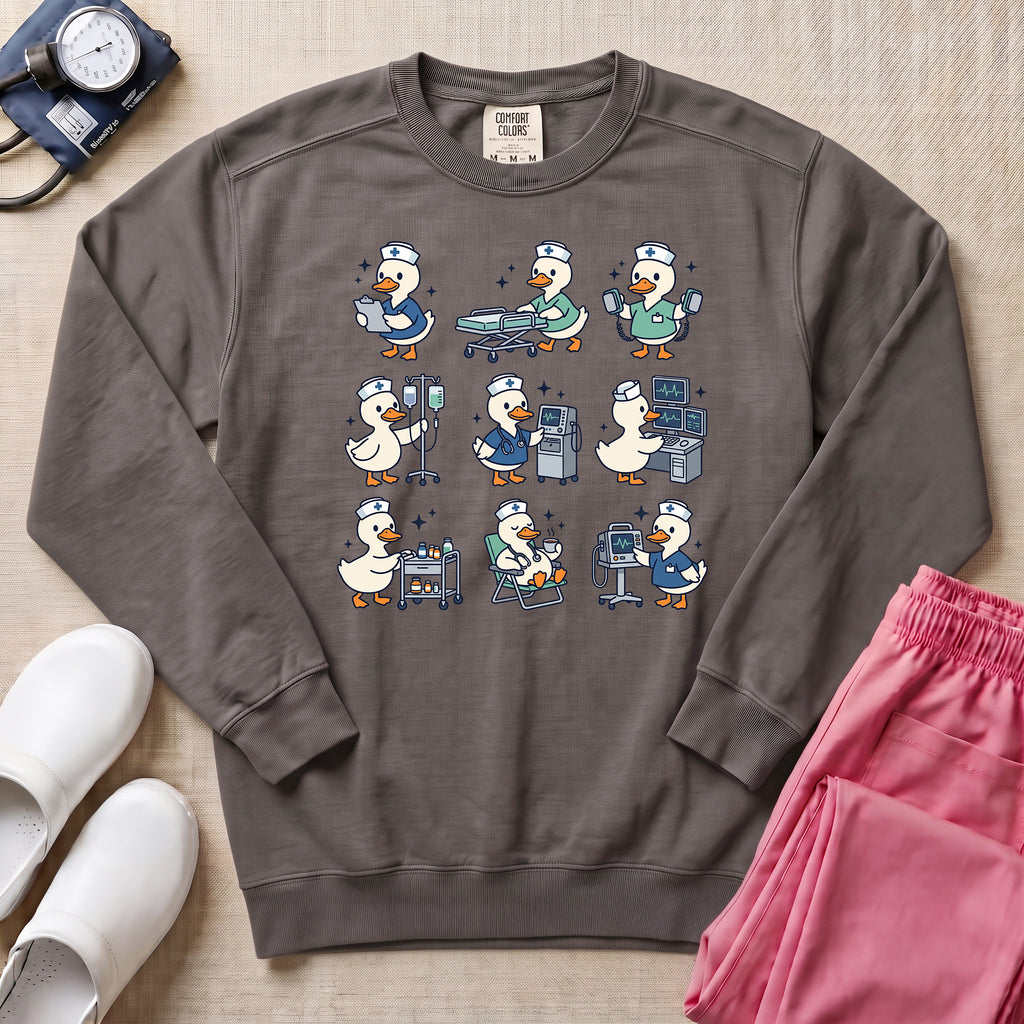 Cute Duck Nurse Hospital Routine Daily Shift Sweatshirt - Pepper Lifestyle Hero Mockup | HugTee