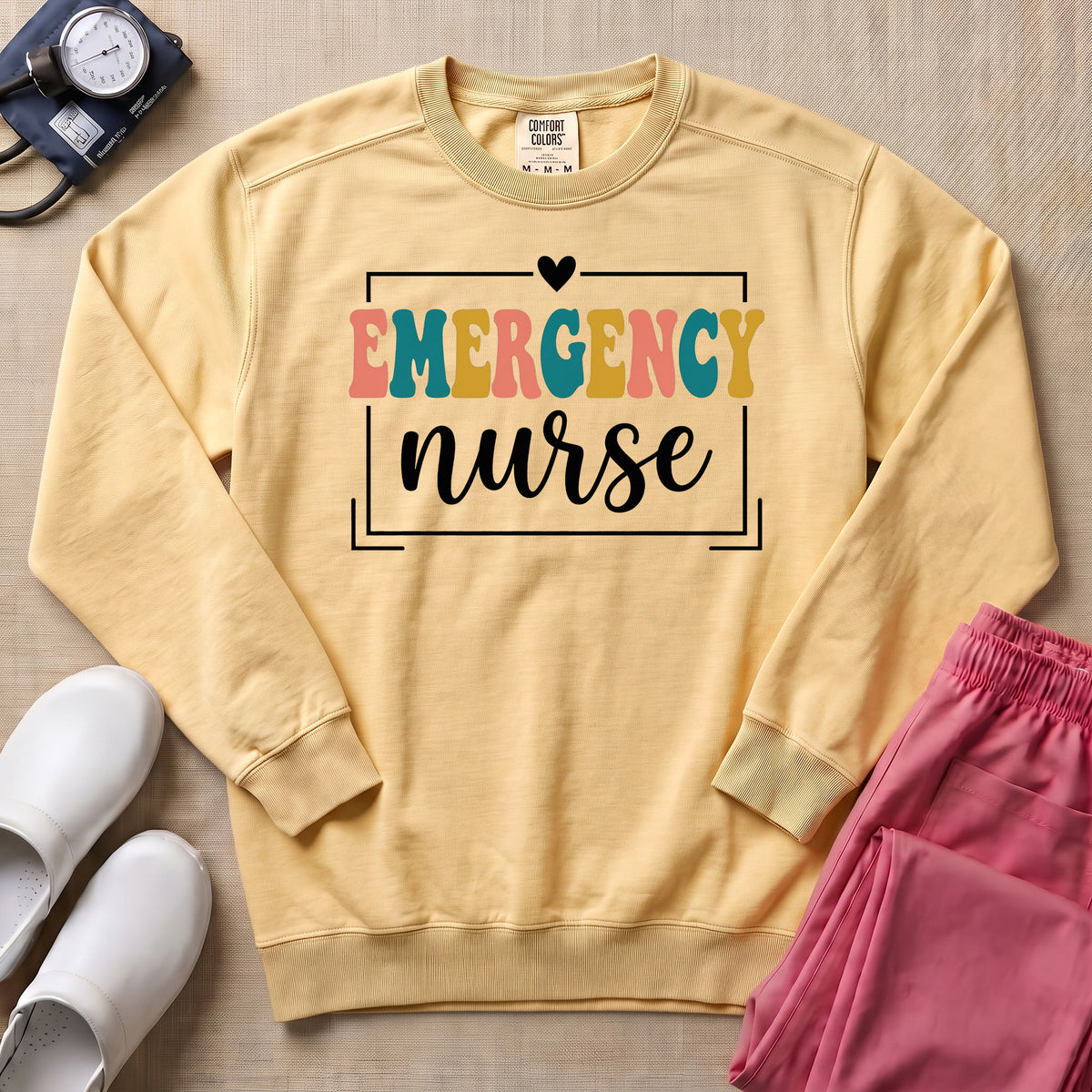 Retro Emergency Nurse Groovy ER Nurse Sweatshirt - Butter Comfort Colors Sweatshirt | HugTee
