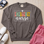 Emergency Nurse Retro Vintage Groovy Sweatshirt - Pepper Lifestyle Hero Mockup | HugTee