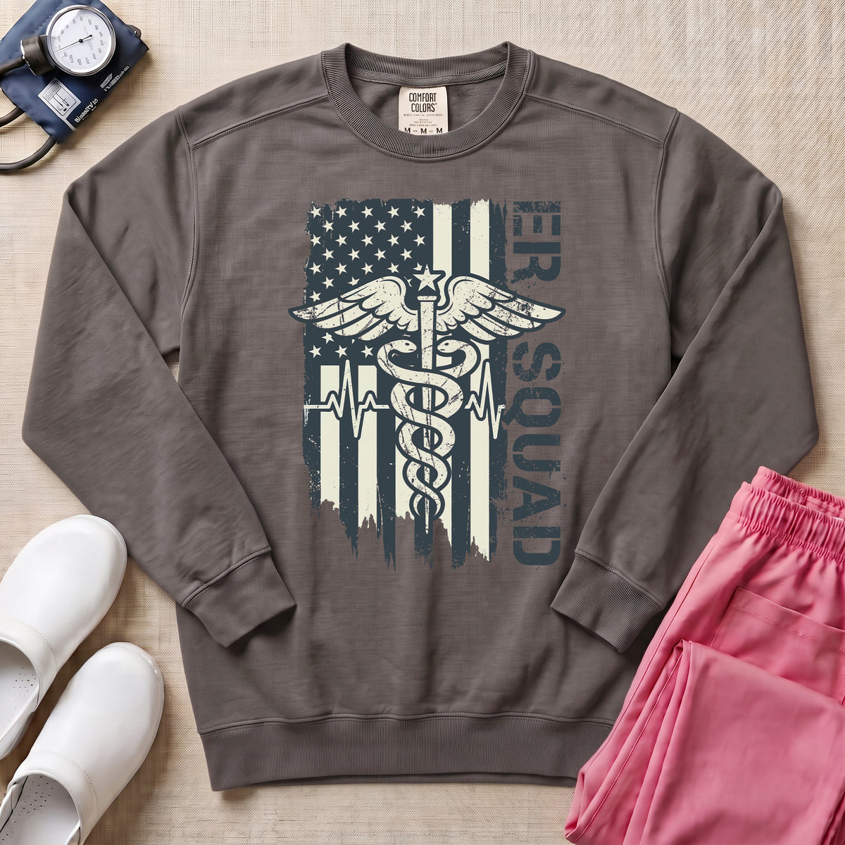 Patriotic ER Squad Caduceus American Flag Emergency Room Nurse Sweatshirt - Pepper Lifestyle Hero Mockup | HugTee