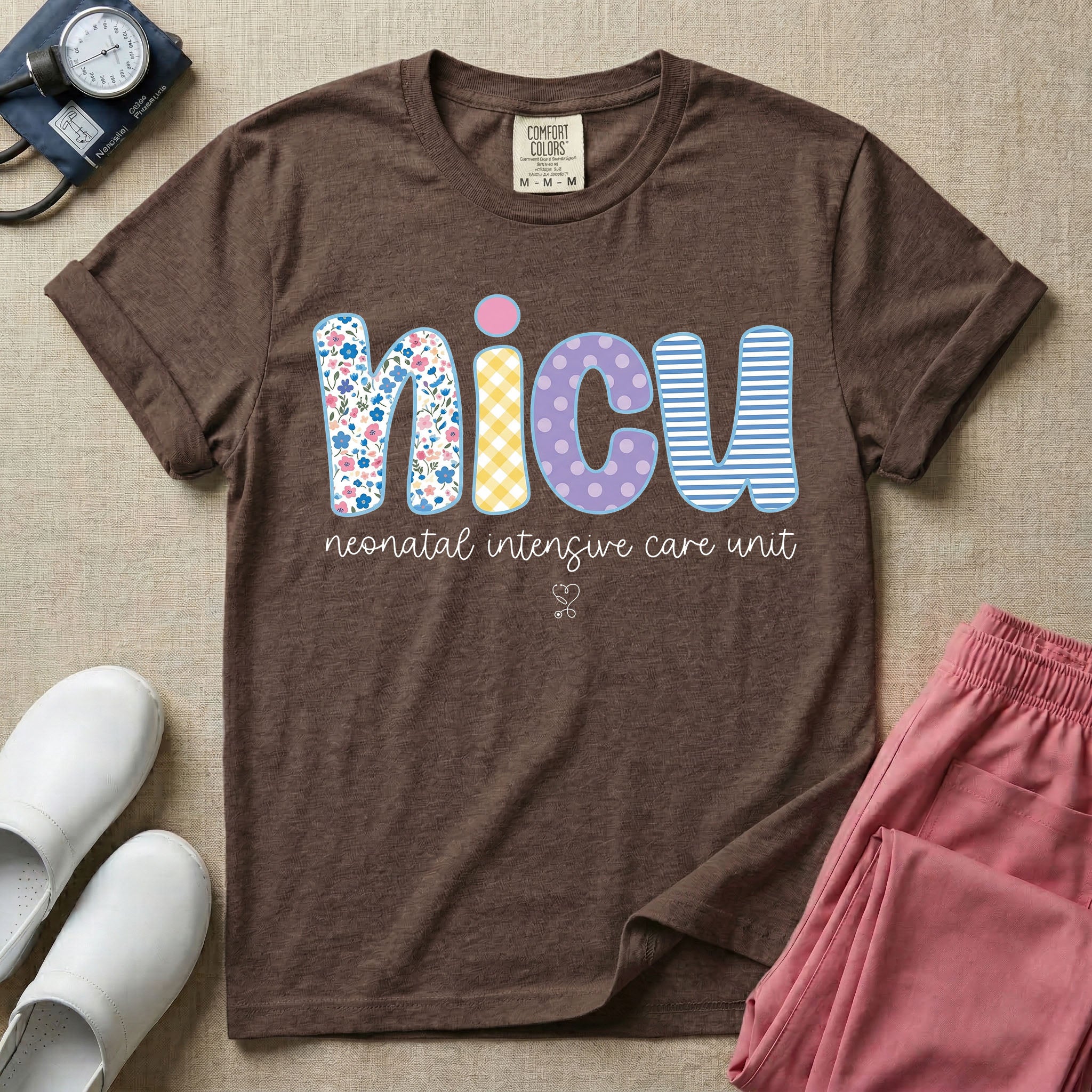 Neonatal Intensive Care Unit NICU nurse t-shirt with boho floral block letters in espresso color.