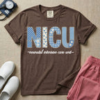 A t-shirt for NICU nurses featuring the large text "NICU" designed to look like faux embroidery with floral and plaid patterns, and the words "neonatal intensive care unit" written in a delicate script font underneath.