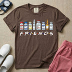 A humorous retro-style t-shirt for nurses featuring a row of seven different medical vials and medicine ampules lined up above the word "FRIENDS", which is styled with colored dots between the letters to resemble the classic television show logo.