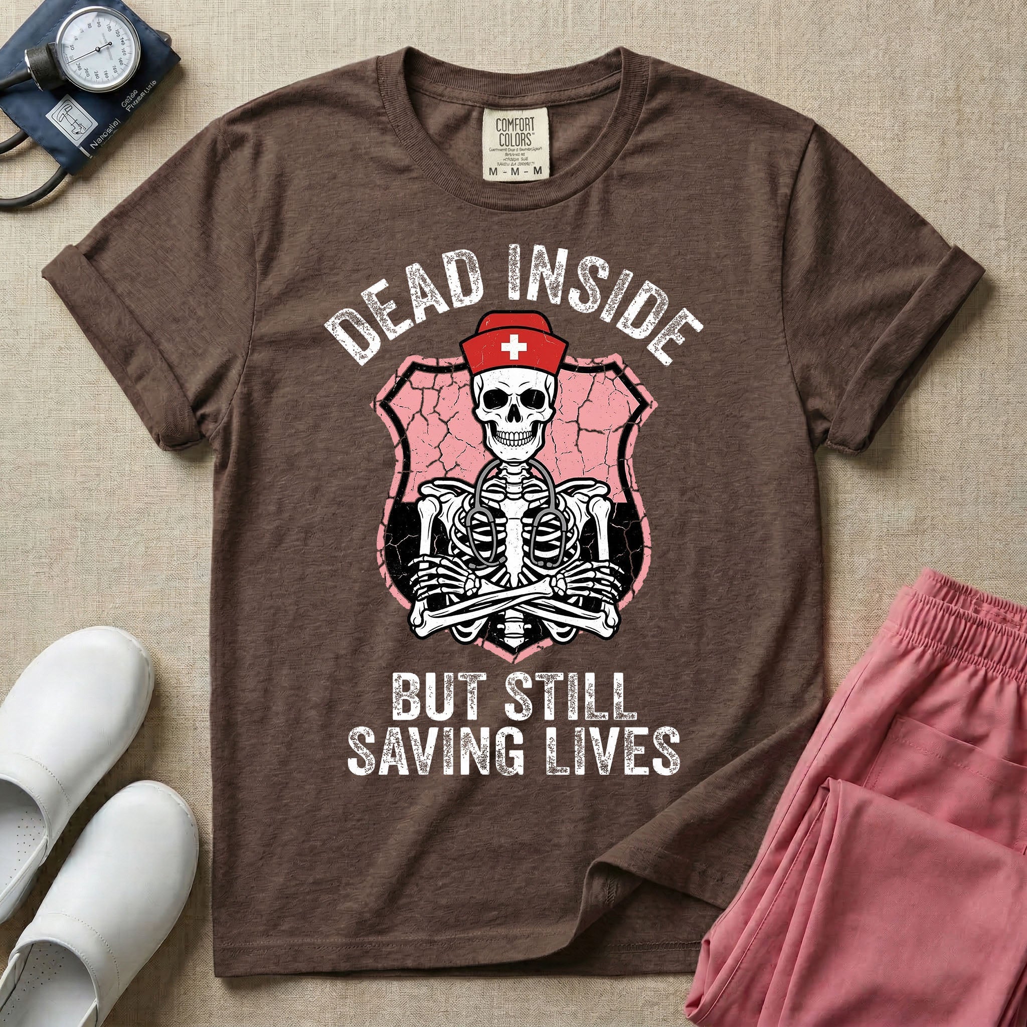 General nursing nurse t-shirt with a funny skeleton dead inside but still saving lives graphic in espresso color.